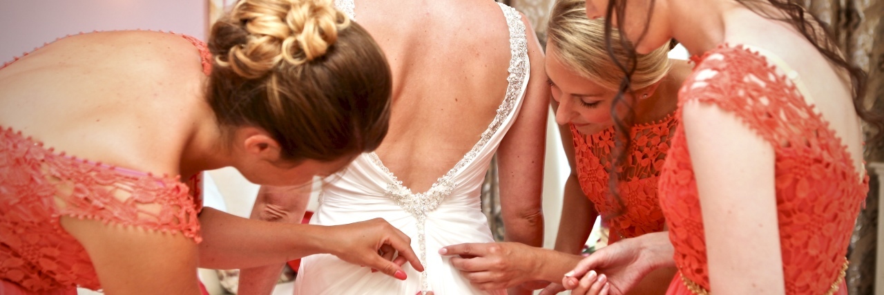 10 Tips for Brides-to-Be With ADHD Bridesmaids preparing bride for wedding.