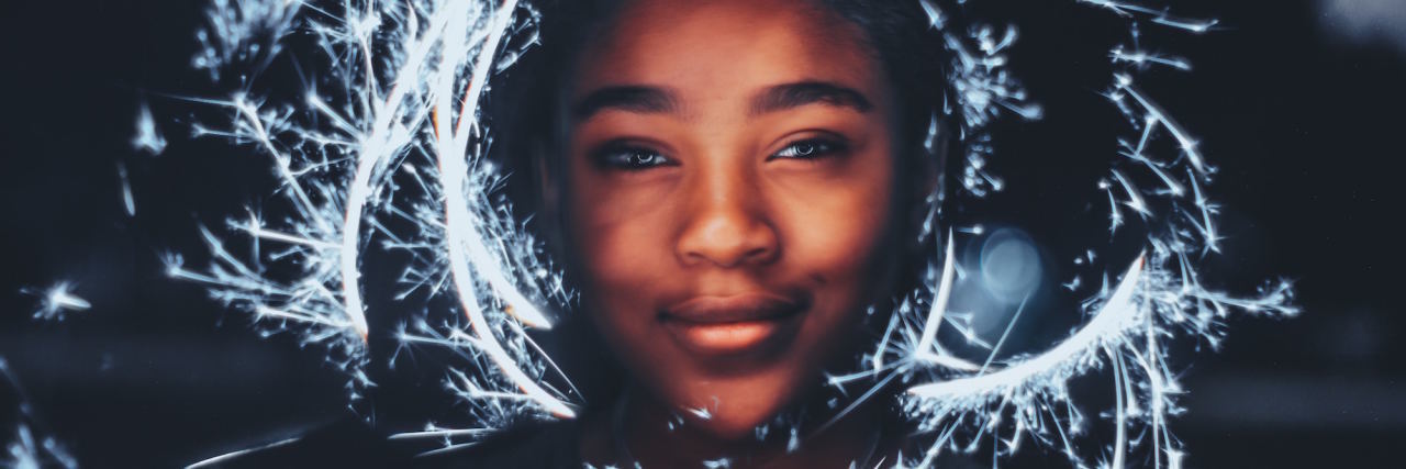 Self-Preservation Is How I Self-Care as a Black Woman With Depression woman with light halo around face