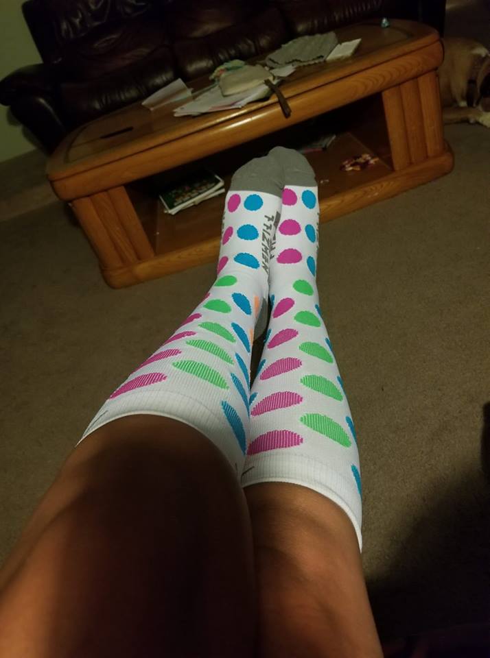 woman wearing polka dot compression stockings