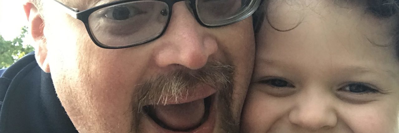 What's Different About Parenting a Child on the Autism Spectrum? Father hugging son