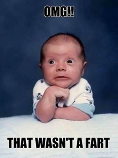 baby looking worried. the caption says 'oh no... that wasn't a fart'