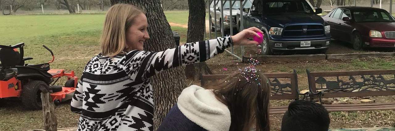 Celebrating Our Accomplishments in Life With a Disability Krista outside with friends.