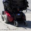 Woman in a power wheelchair.