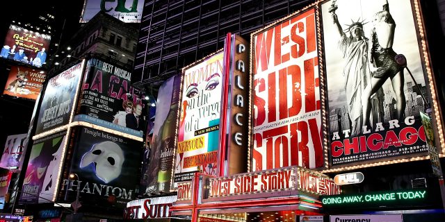 5 Showtunes I Relate to as an Autistic Person Broadway theater billboards in Times Square.