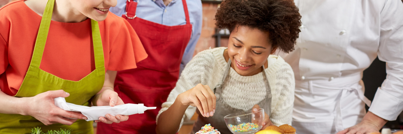 Supporting Young Entrepreneurs With Disabilities Young people learning to bake.