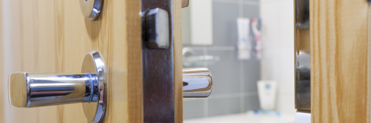 Disability and the Right to Privacy Open door to the bathroom.