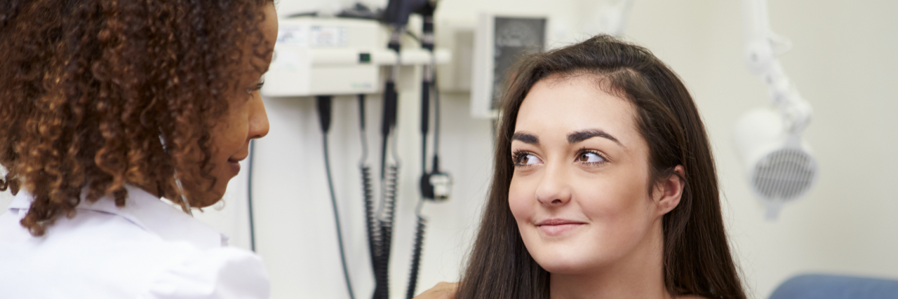 Finding a Good Doctor for Cerebral Palsy and Chronic Pain Doctor examining patient.