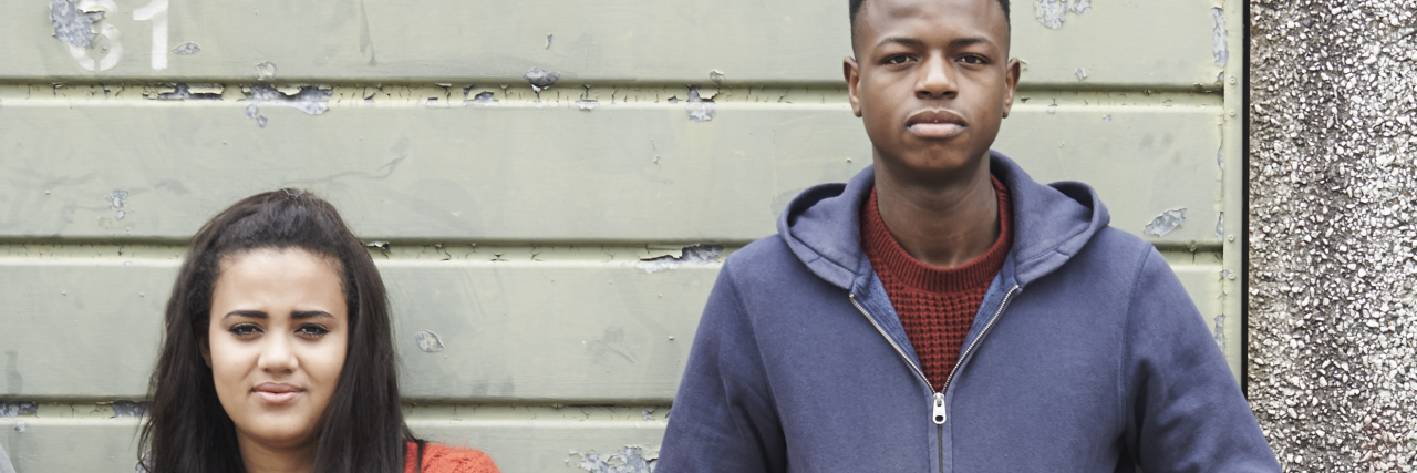 Why African-Americans Struggle With Mental Health in Silence Gang Of Teenagers Hanging Out In Urban Environment