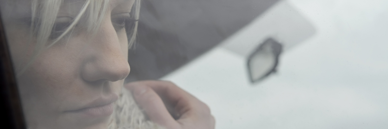 Eating Disorder: When Counting Calories Takes Over Your Life A woman wearing a scarf looking away