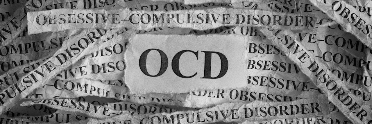 How I Combat Ignorance About OCD ripped papers that say OCD