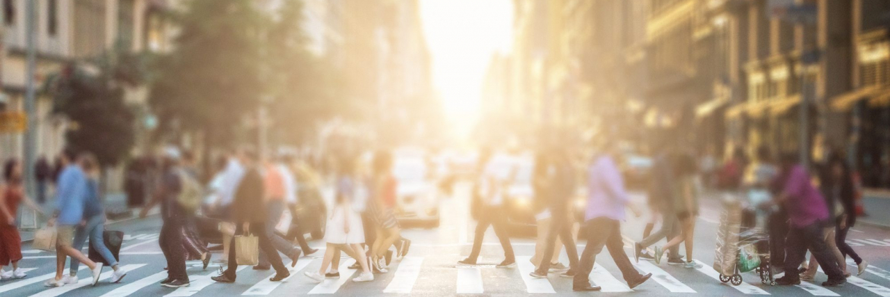 To the Mean Stranger Who Judged My Parenting Abilities, Thank You Group of people walking across a pedestrian crosswalk.