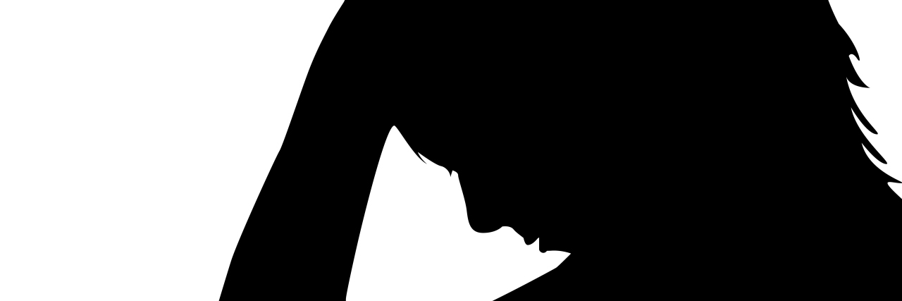 silhouette of a woman with her hands on her head