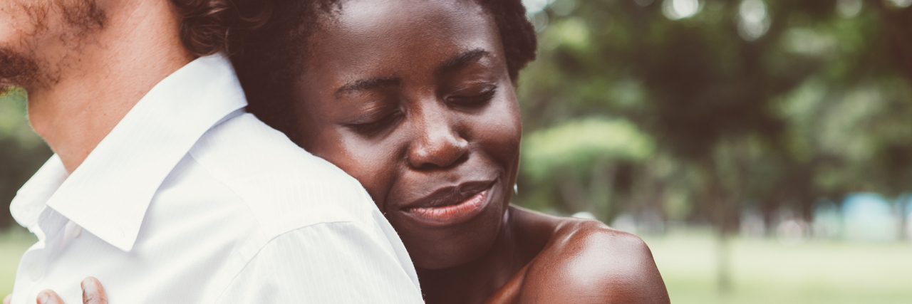 What Loving Someone With a Mental Illness Has Taught Me A woman holding her partner