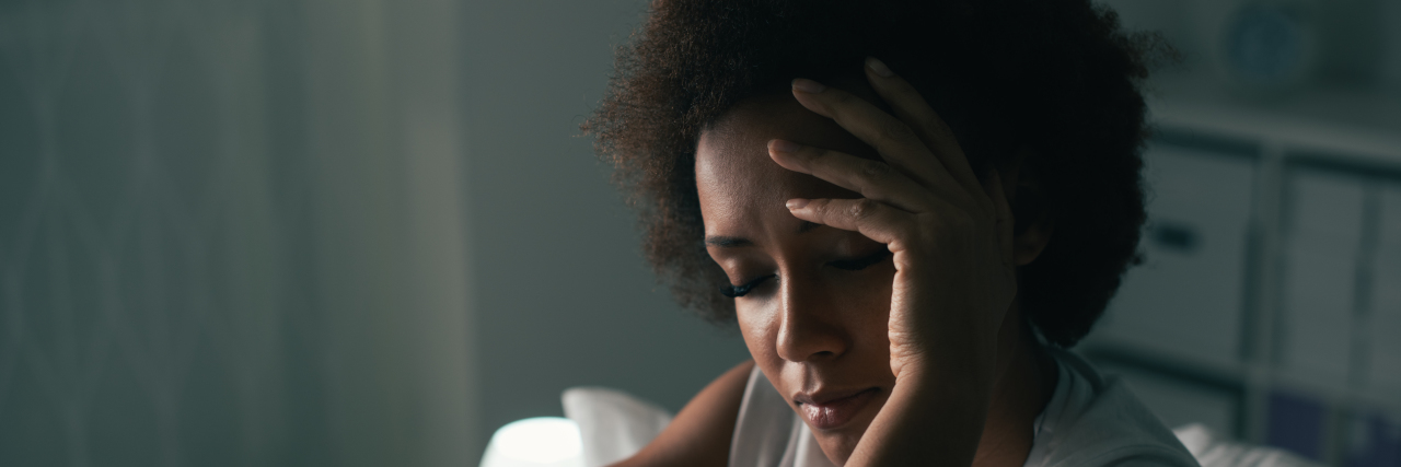 Dear Hollywood, Please Represent Characters With Migraine woman getting a migraine at night