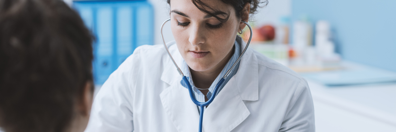 It's OK to Keep Searching for a GP Until You Find One You Like doctor measuring a female patient's blood pressure