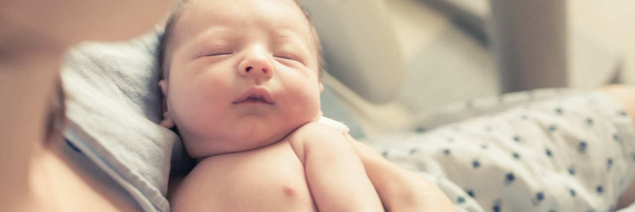 Postpartum Depression: Grief for the Mother I Expected to Be newborn baby in mother's arms