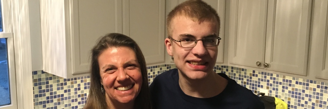 Letter to My Autistic Son on His 18th Birthday Mother and son smiling at camera