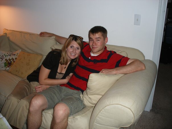 A photo of the writer with her husband, sitting on a couch.
