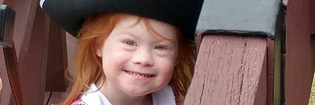 My Child With Down Syndrome Makes Me Wonder if I'm Missing Something Little girl with down syndrome