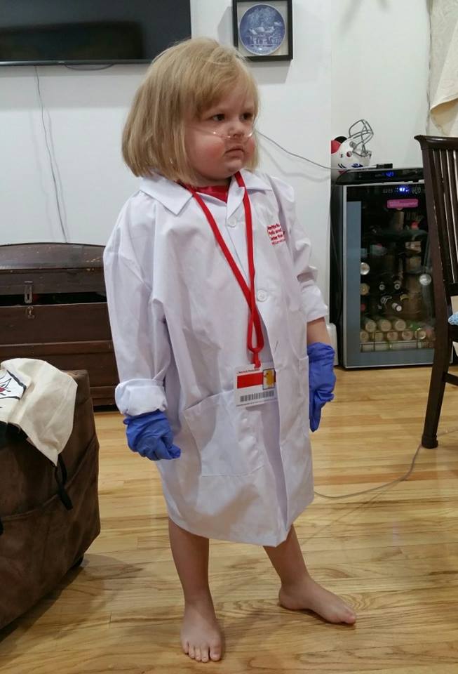 little girl dressed as a nurse