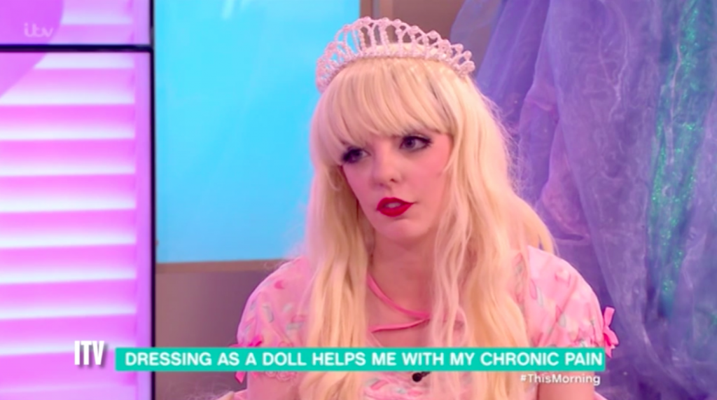 Jade Smith, a woman who cosplays as a doll to cope with fibromyalgia pain, is interviewed on "This Morning"