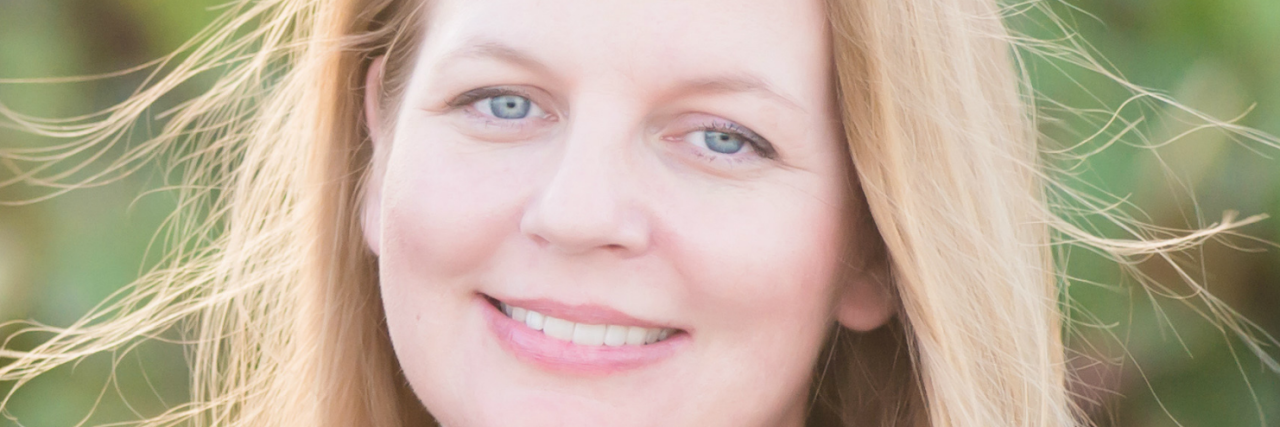 This Is Why I Refuse to Hide My Thyroid Cancer Battle Wounds woman with thyroid cancer scar on throat