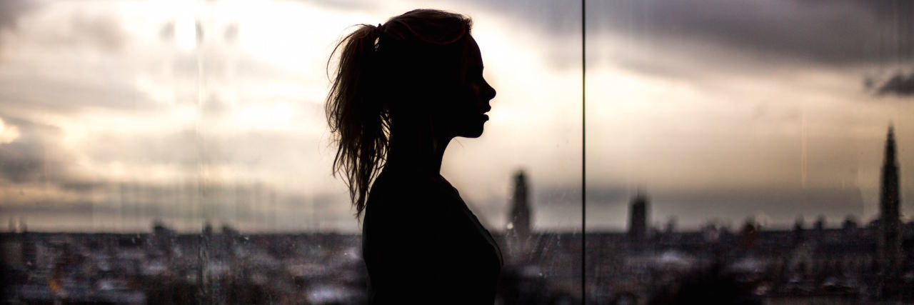 When You're Depressed and Living In Between 'Sick' and 'Well' woman silhouette