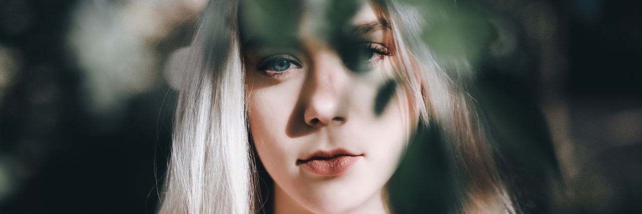 Anxiety Makes Me Think Everything Is My Fault woman behind tree