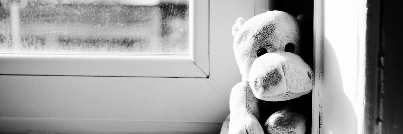 The Real Ramifications of Having Emotional Walls hippo toy on window sill black and white