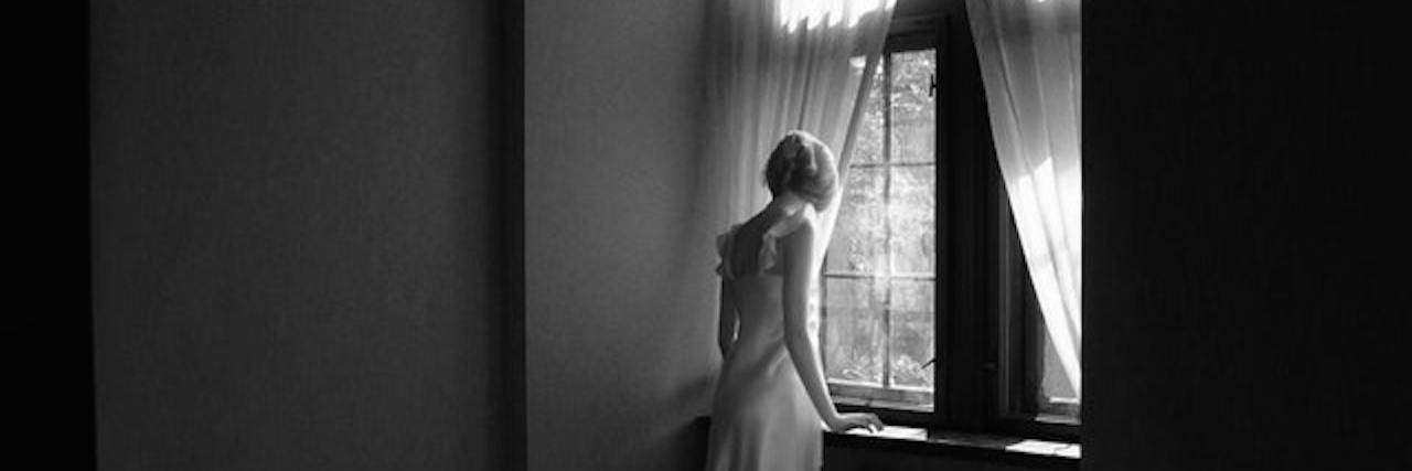 Life After a Primary Immunodeficiency Diagnosis photo of the author standing by a window