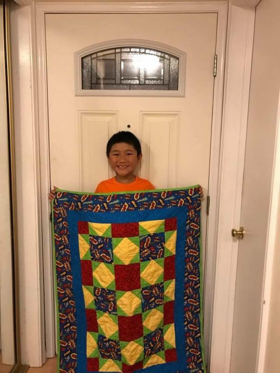 boy with quilt