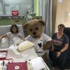 the author's daughter in the hospital with a giant teddy bear