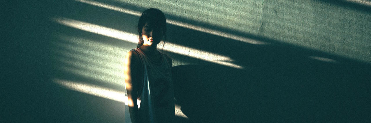 When Sexual Assault Leaves You Feeling Suicidal woman in shadows
