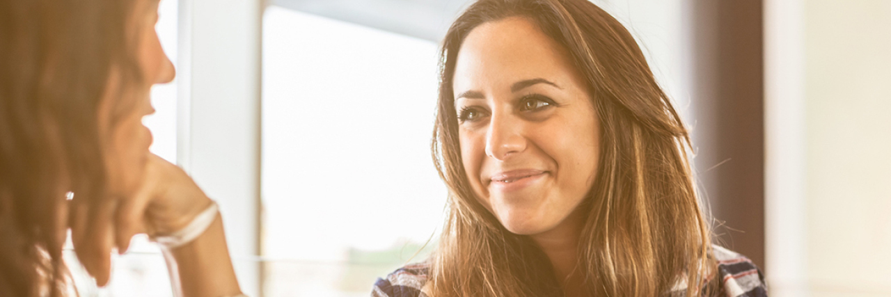 What to Say to a Loved One Who Tells You They're Depressed Two friends getting coffee at a coffee shop, looking at each other. Text says: 19 Real Ways People Reacted When Their Loved Ones Said 'I'm Depressed'