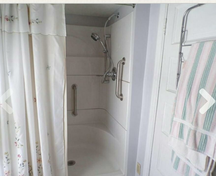 shower with features that make it more accessible