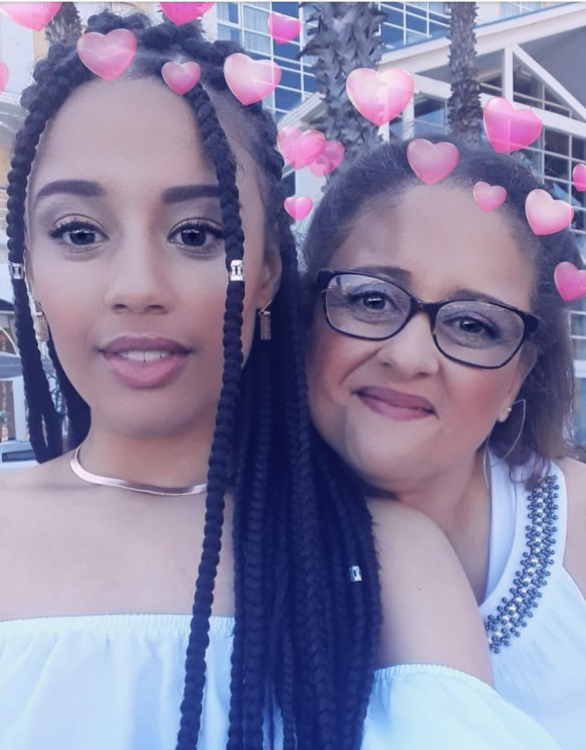 mom and her daughter with a heart snapchat filter
