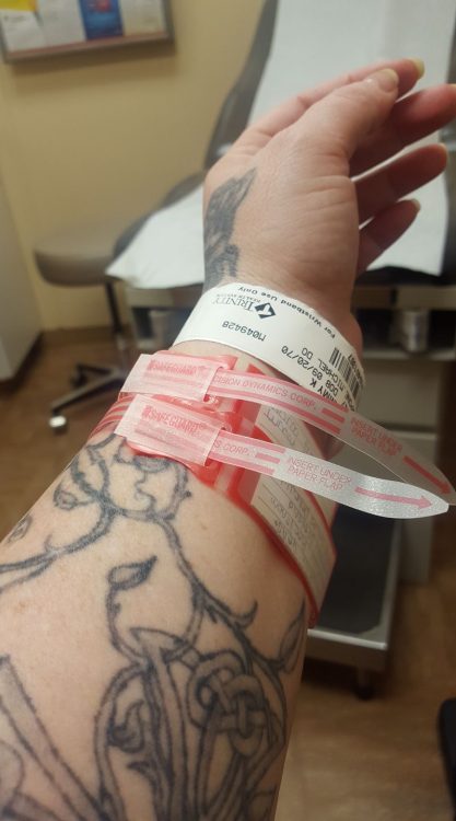 Kaye's two medical bracelets in the hospital