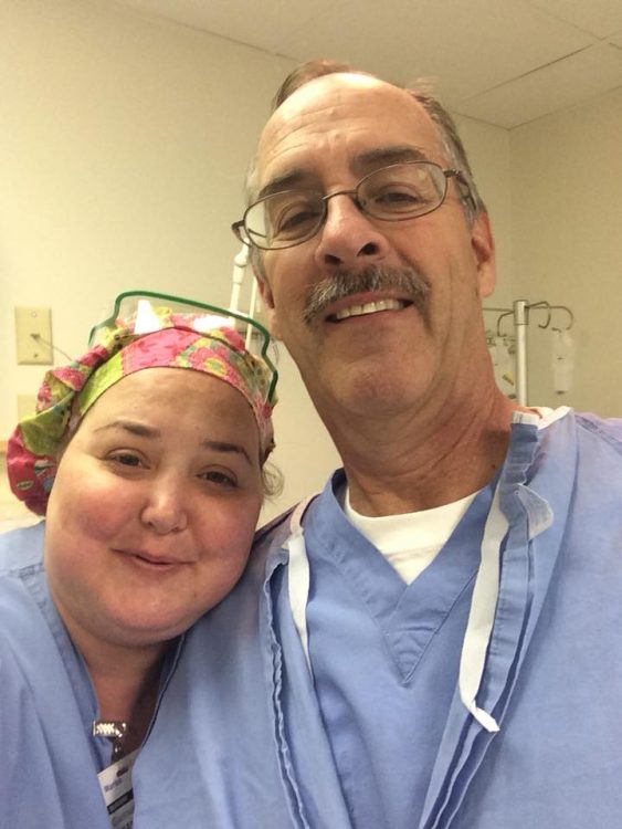 man and woman wearing scrubs