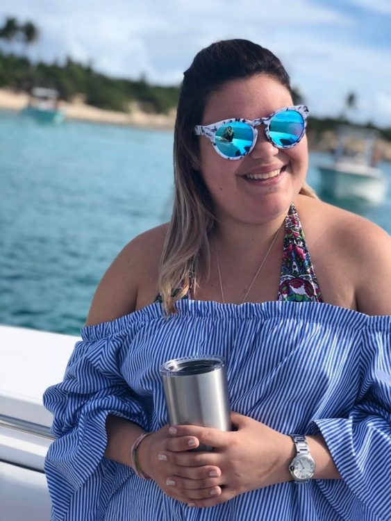 woman wearing sunglasses on a boat