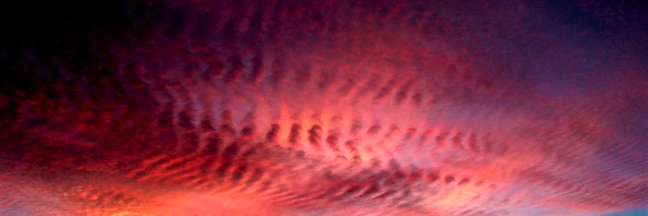 Reflections on Pain, Suffering and Meaning pink sunset