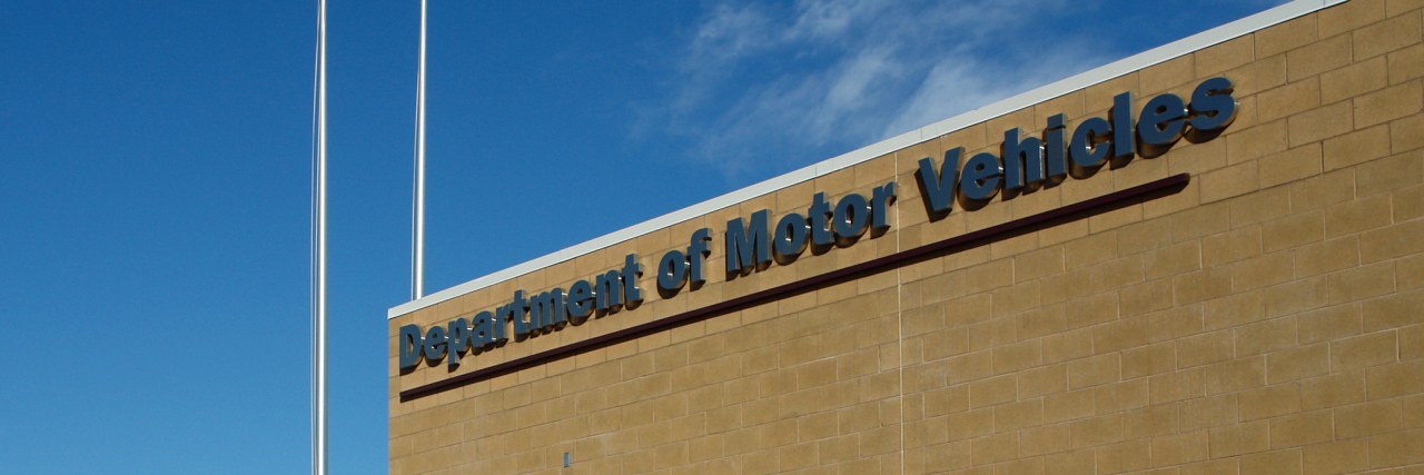 A Department of Motor Vehicles DMV brick building.
