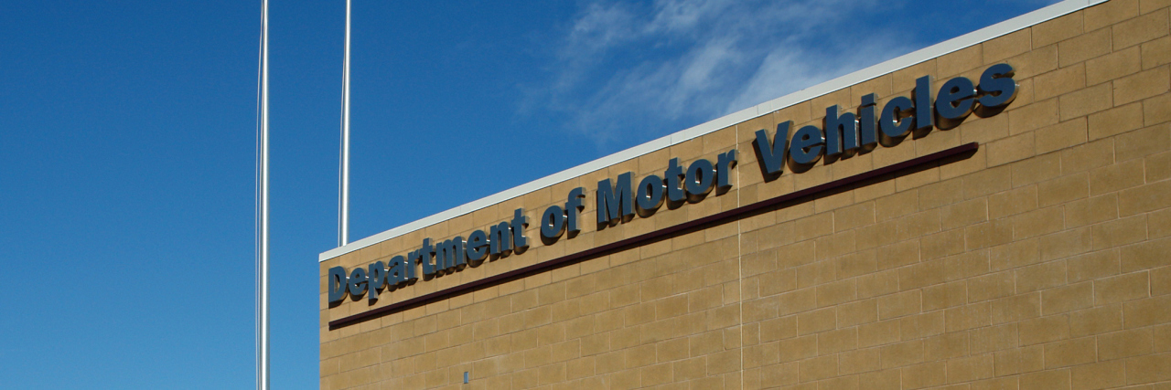 Achieving Success as a Man With Autism A Department of Motor Vehicles DMV brick building.