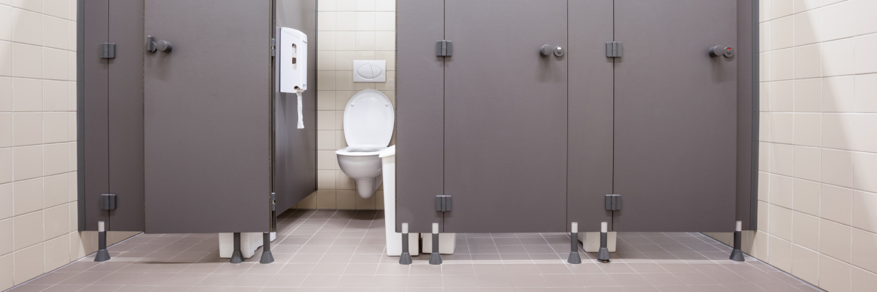 Dealing With Public Restrooms When You Have Crohn's Disease stalls in a public restroom