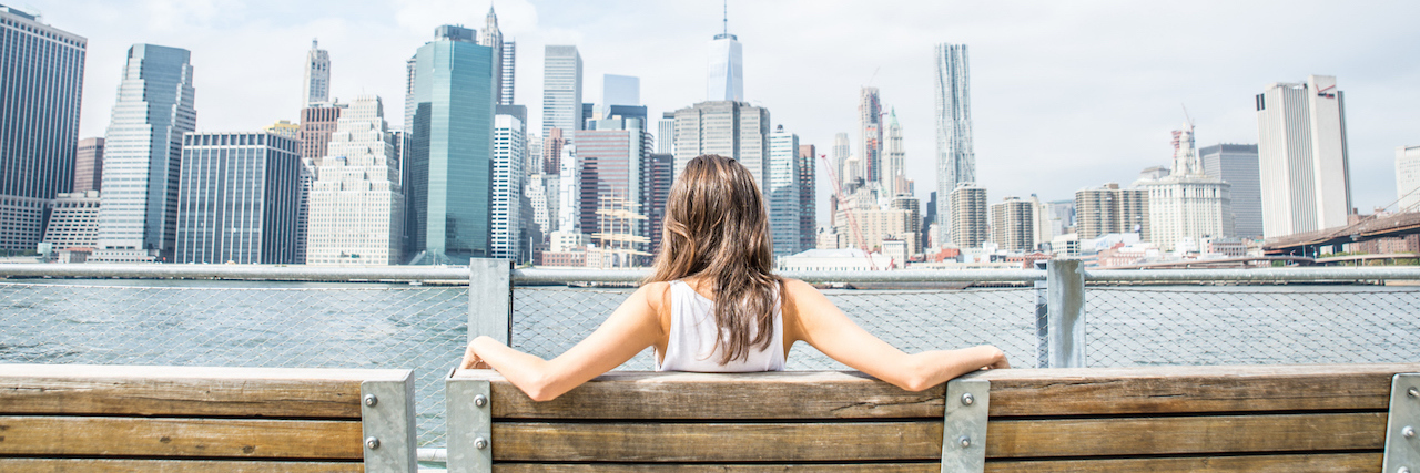 Woman watching New York skyline