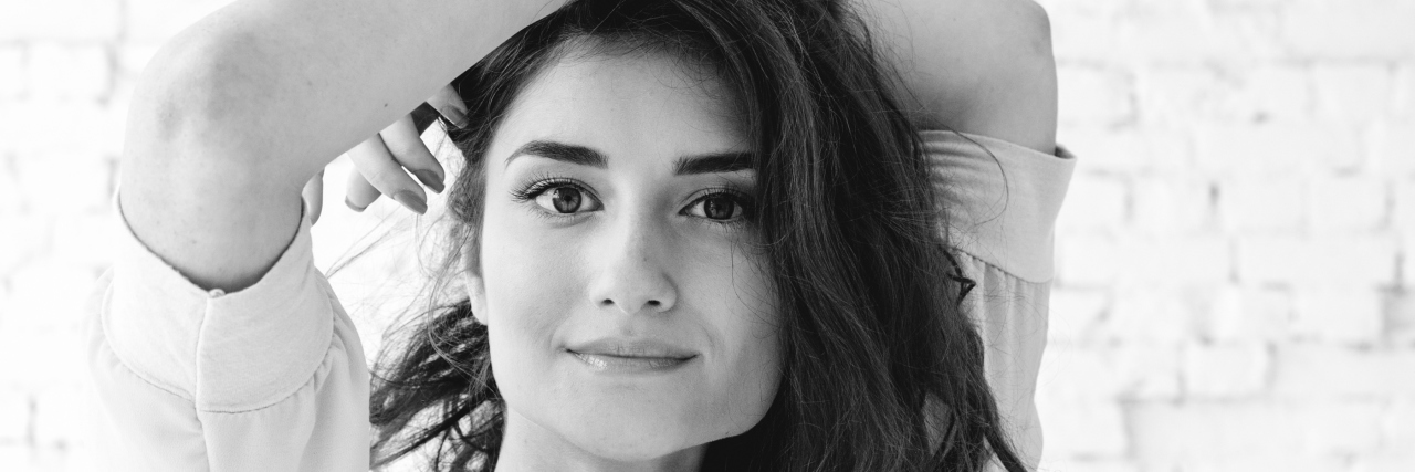 When Your Health Prevents You From Doing the Things That Bring You Joy A black and white image of a woman with a soft smile.