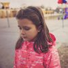 Sad girl in the school playground