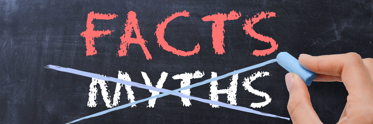 Busting Autism Myths Myths or Facts with woman hand drawing on blackboard.