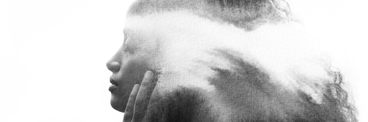 How I Explain 'Chemo Brain' A woman connects with her own thoughts and inner world as her gentle hands touch