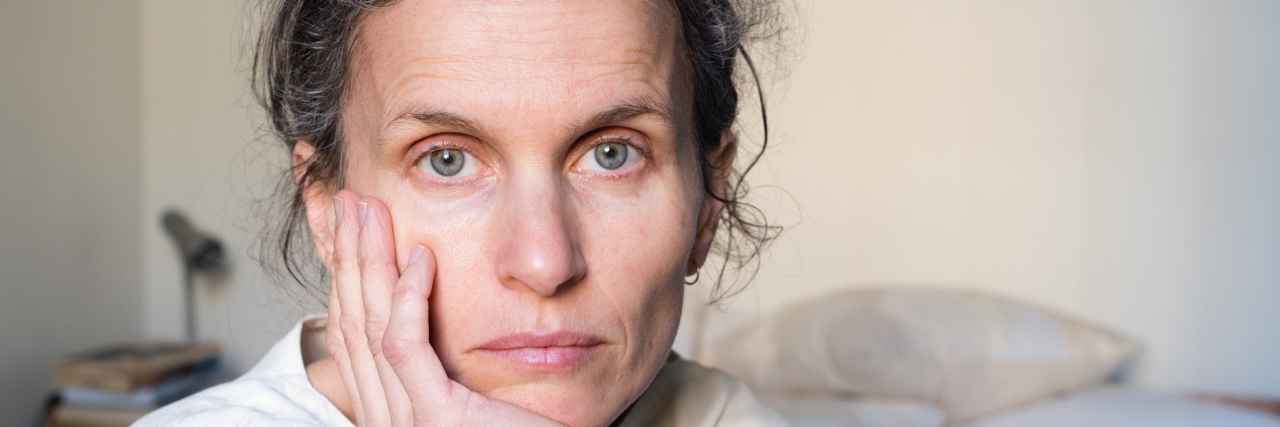 When My 'Good' Health Days Are Disappearing A middle-aged woman looking directly at the camera with a sad expression.