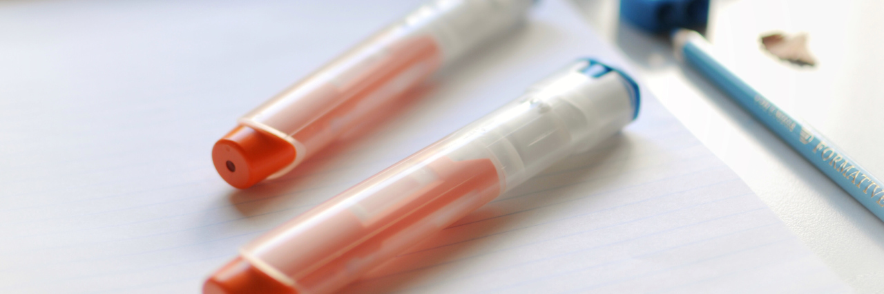 FDA Approves First Migraine Prevention Drug, Aimovig two autoinjectors